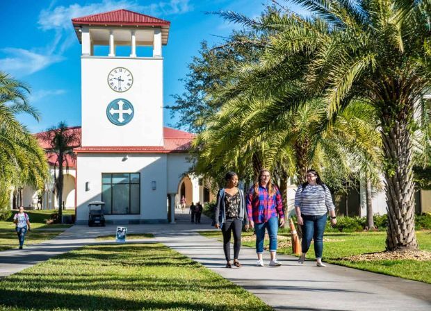 students walking on saint leo university campus