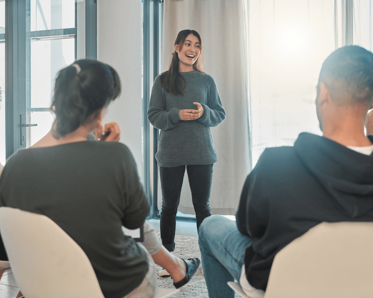 young adult leading conversation young adult leading conversation